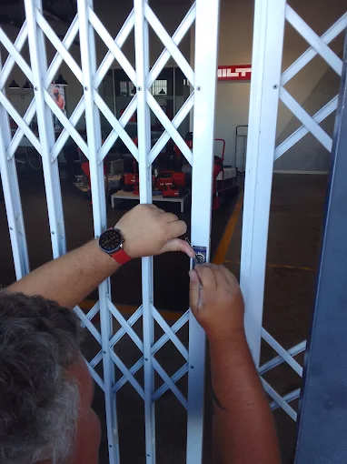 AAA Locksmiths technician installing door hardware