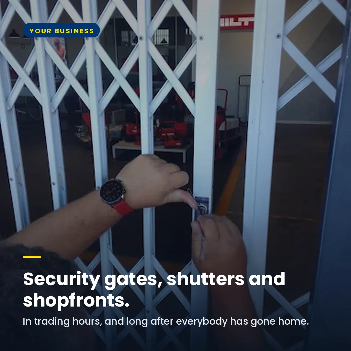 An AAA locksmith repairing the lock on a security gate at business premises