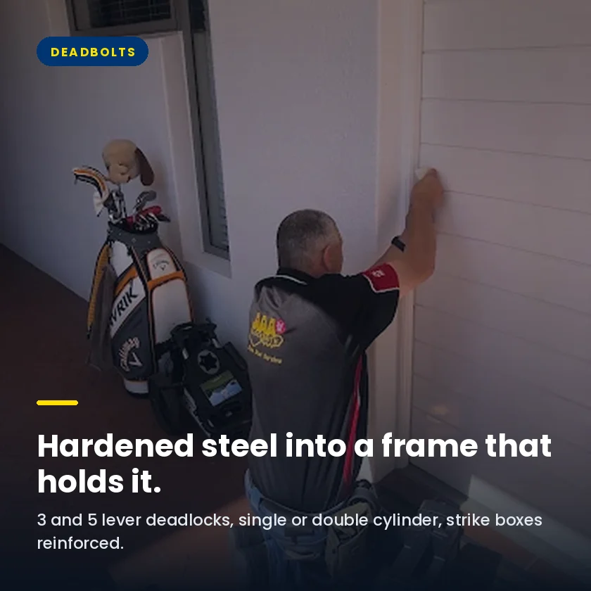 An AAA Locksmiths technician fitting a deadbolt to a Cape Town door
